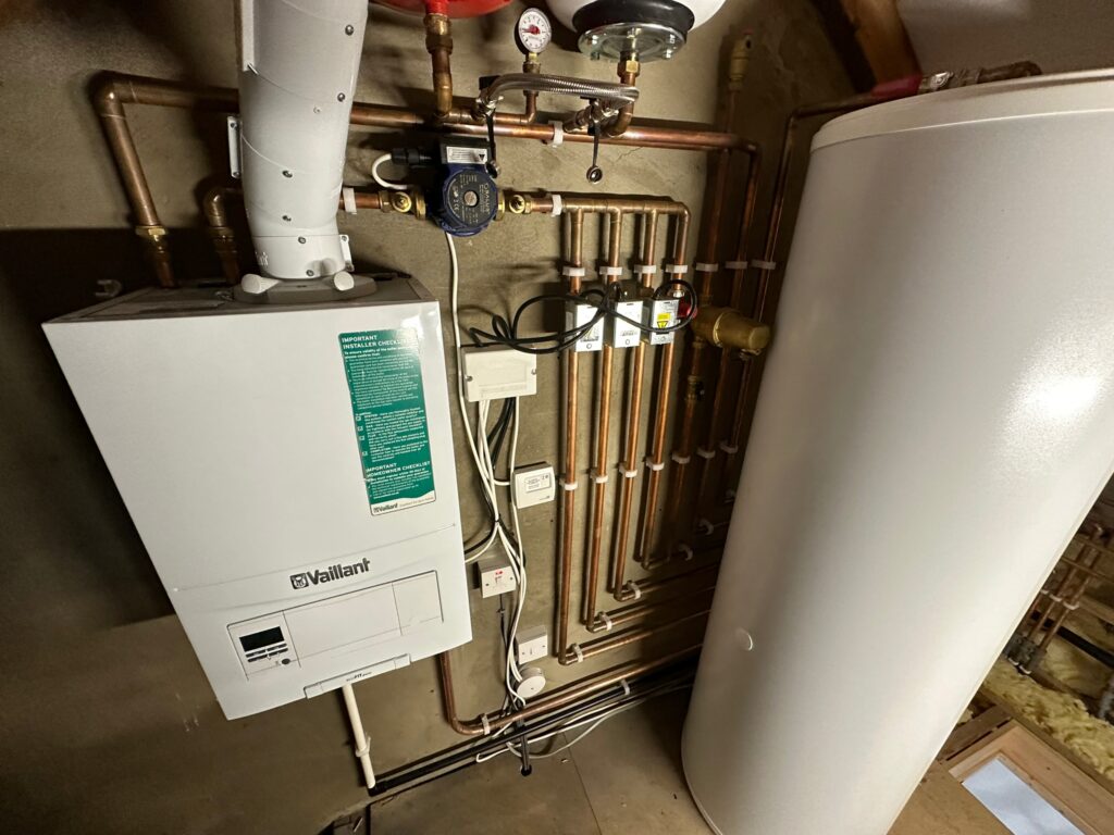 gas-boiler in corner of loft