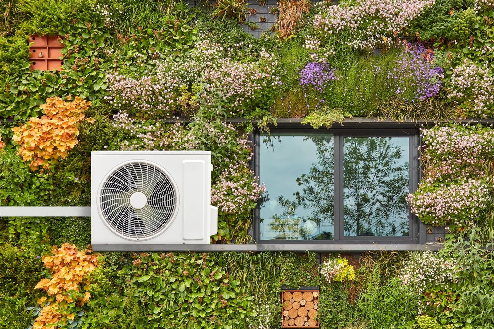 Air-source,Heat,Pump,On,A,Green,Sustainable,Building,Covered,With